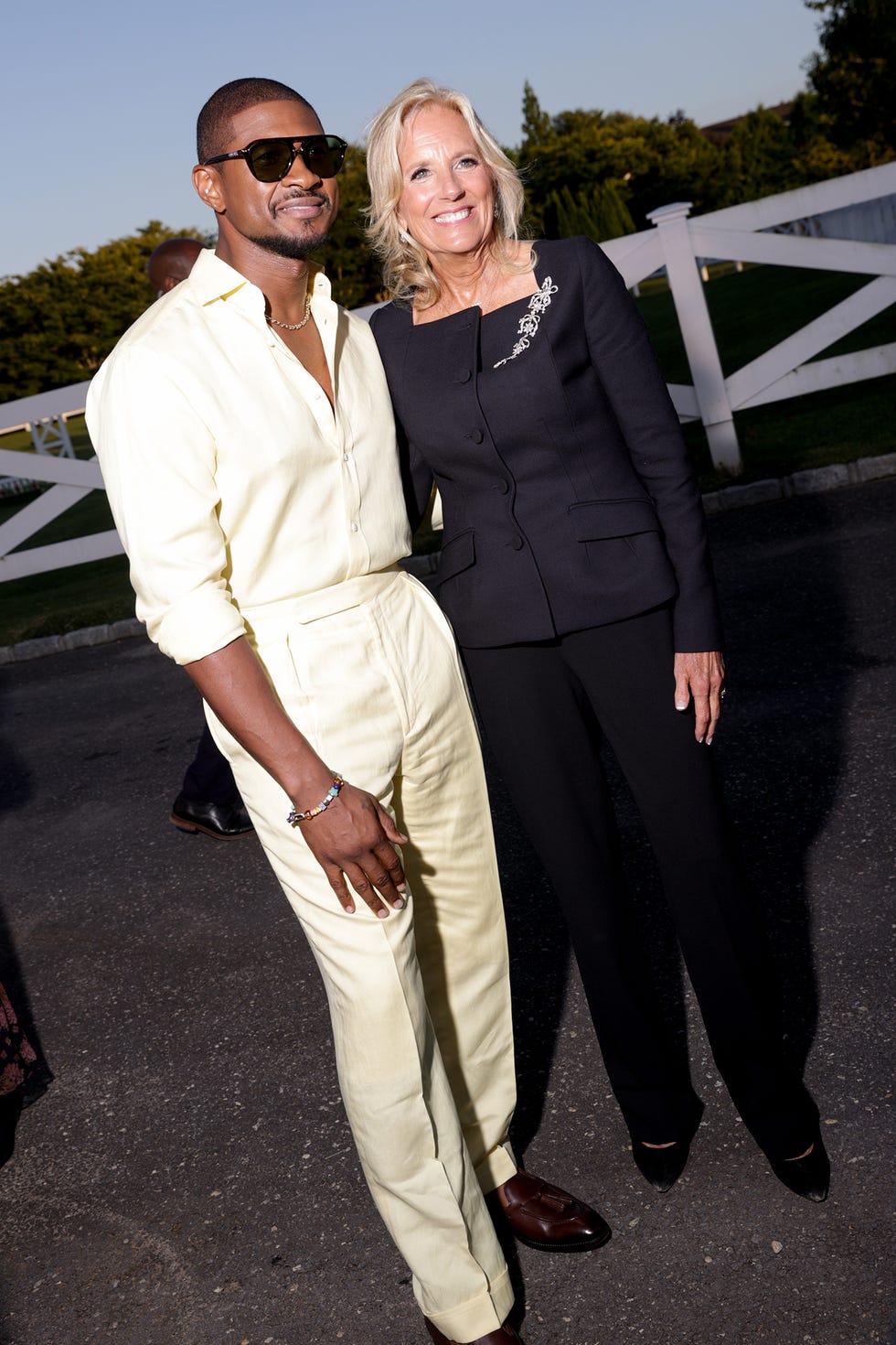 usher and dr jill biden at ralph lauren rtw spring 2025 as part of new york ready to wear fashion week on september 5, 2024 in east hampton, new york photo by lexie morelandwwd via getty images