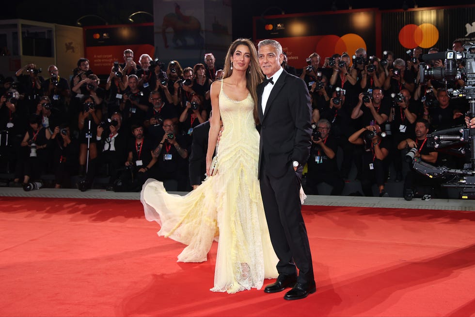 Venice, Italy September 1 Amal Clooney and George Clooney visit the red carpet for The Wolfs during the 81st Venice International Film Festival on September 1, 2024 in Venice, Italy Photo by Daniele Venturelliwireimage