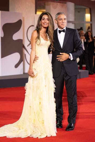 venice, italy september 01 amal clooney and george clooney attend the wolfs red carpet during the 81st venice international film festival on september 01, 2024 in venice, italy photo by alessandro levatigetty images