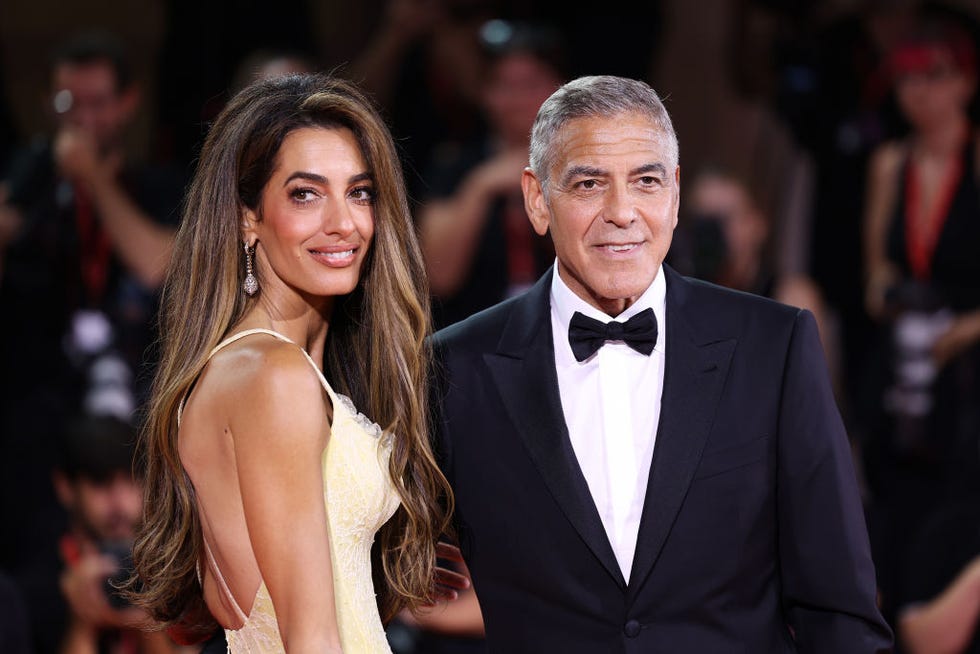 venice, italy september 01: amal clooney and george clooney attend the wolfs red carpet during the 81st venice international film festival on september 01, 2024 in venice, italy. (photo by maria moratti/getty images)