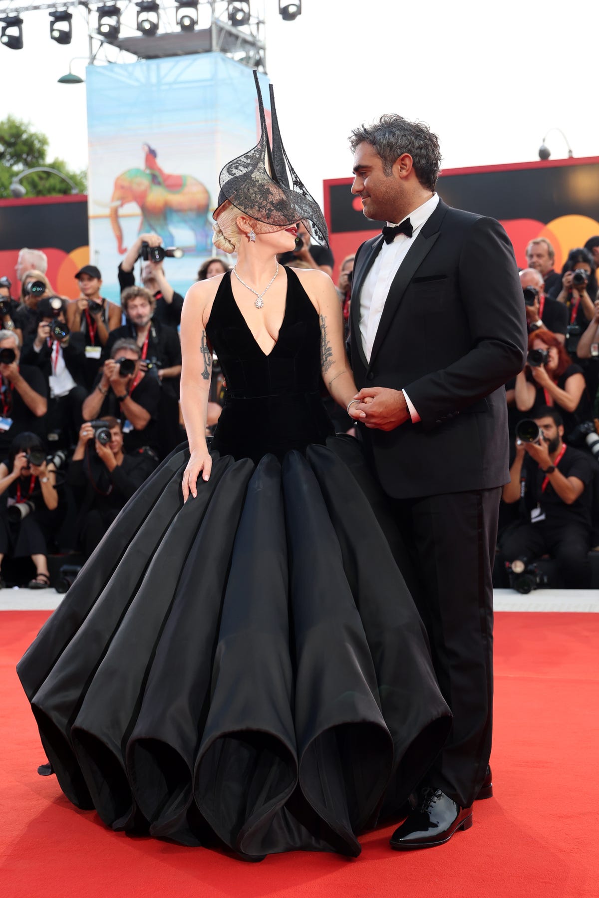 Lady Gaga Makes Her Red-Carpet Debut With Her Fiancé in a Dramatic Black Gown