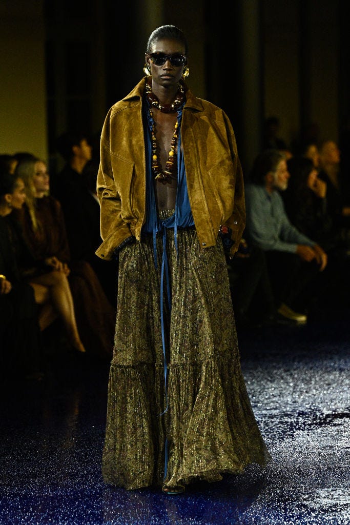 a model presents a creation by saint laurent for the women ready to wear spring summer 2025 collection as part of the paris fashion week, in paris on september 24, 2024 photo by julien de rosa afp photo by julien de rosaafp via getty images