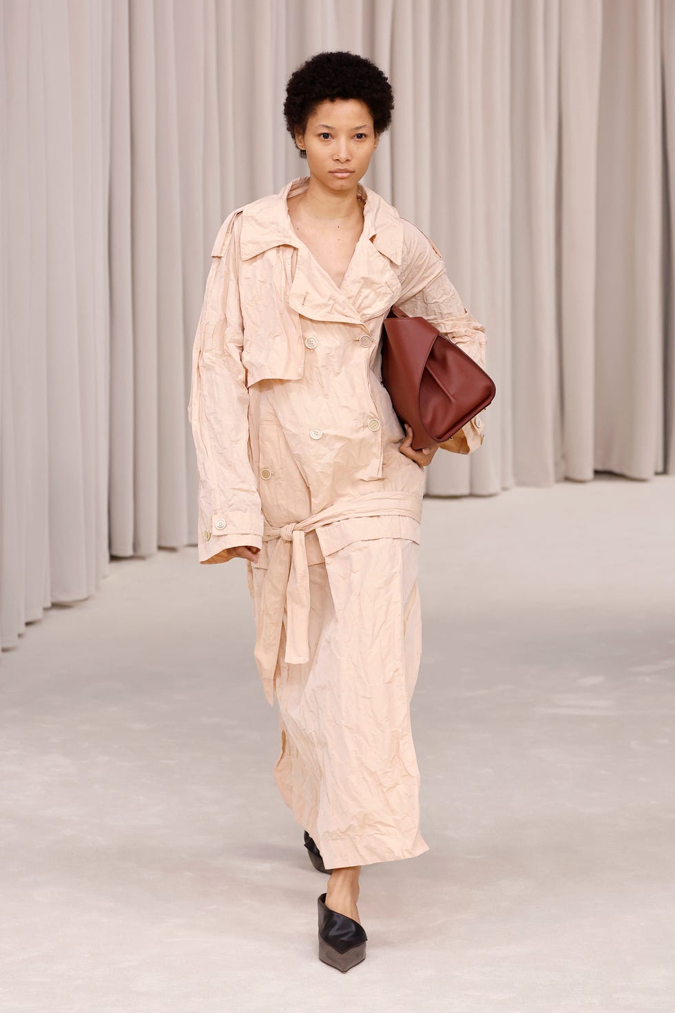 milan, italy september 21 a model walks the runway at the ferragamo fashion show during the milan womenswear springsummer 2025 on september 21, 2024 in milan, italy photo by estropgetty images