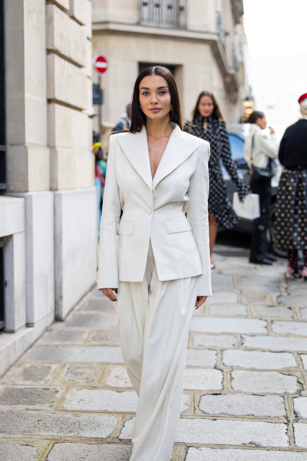 paris, france september 27 amy jackson wears white suit outside nina ricci during womenswear springsummer 2025 as part of paris fashion week on september 27, 2024 in paris, france photo by christian vieriggetty images