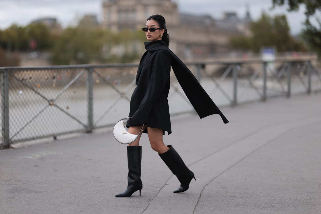 woman wearing all black walking