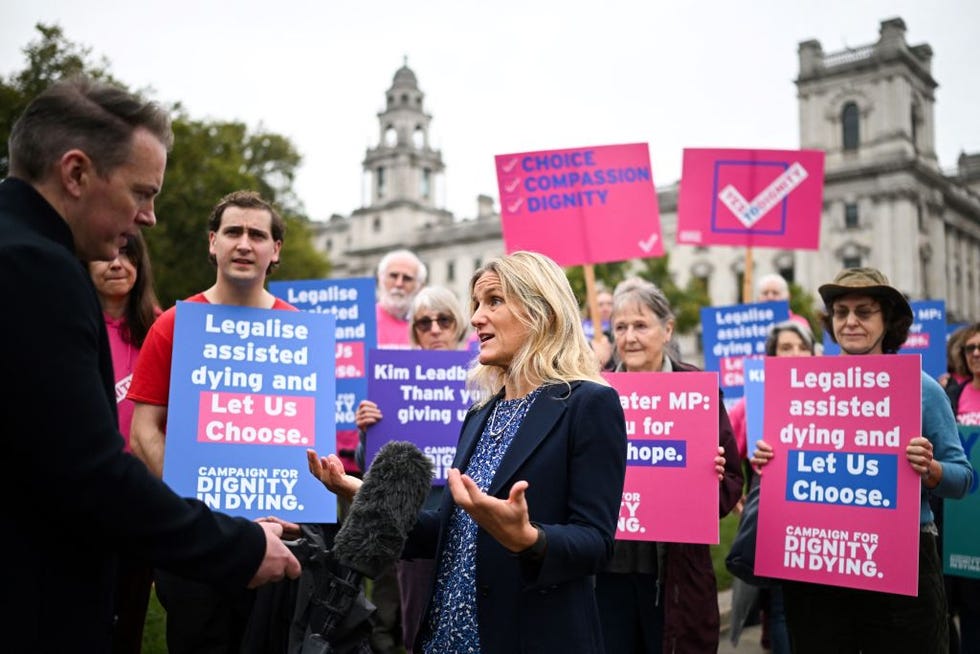 labour mp kim leadbeater speaks to the press during a gathering in favour of the proposal to legalise euthanasia in the uk, called by campaigners from dignity in dying, outside the palace of westminster, home to the houses of parliament in central london, on october 16, 2024 a new proposal to legalise assisted dying in england and wales is introduced in the uk parliament on october 16, 2024, sparking concern from senior church leaders and opponents about the implications of allowing the terminally ill to die on their own terms lawmakers in the house of commons will get a free vote on labour mp kim leadbeaters terminally ill adults end of life bill, allowing them to vote with their conscience rather than along party political lines photo by justin tallis  afp photo by justin tallisafp via getty images