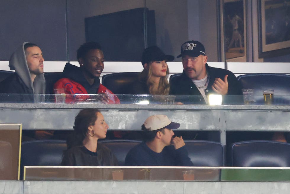 new york, new york october 14 jerrod carmichael, taylor swift and travis kelce attend game one of the american league championship series between the cleveland guardians and the new york yankees at yankee stadium on october 14, 2024 in new york city photo by mike stobegetty images