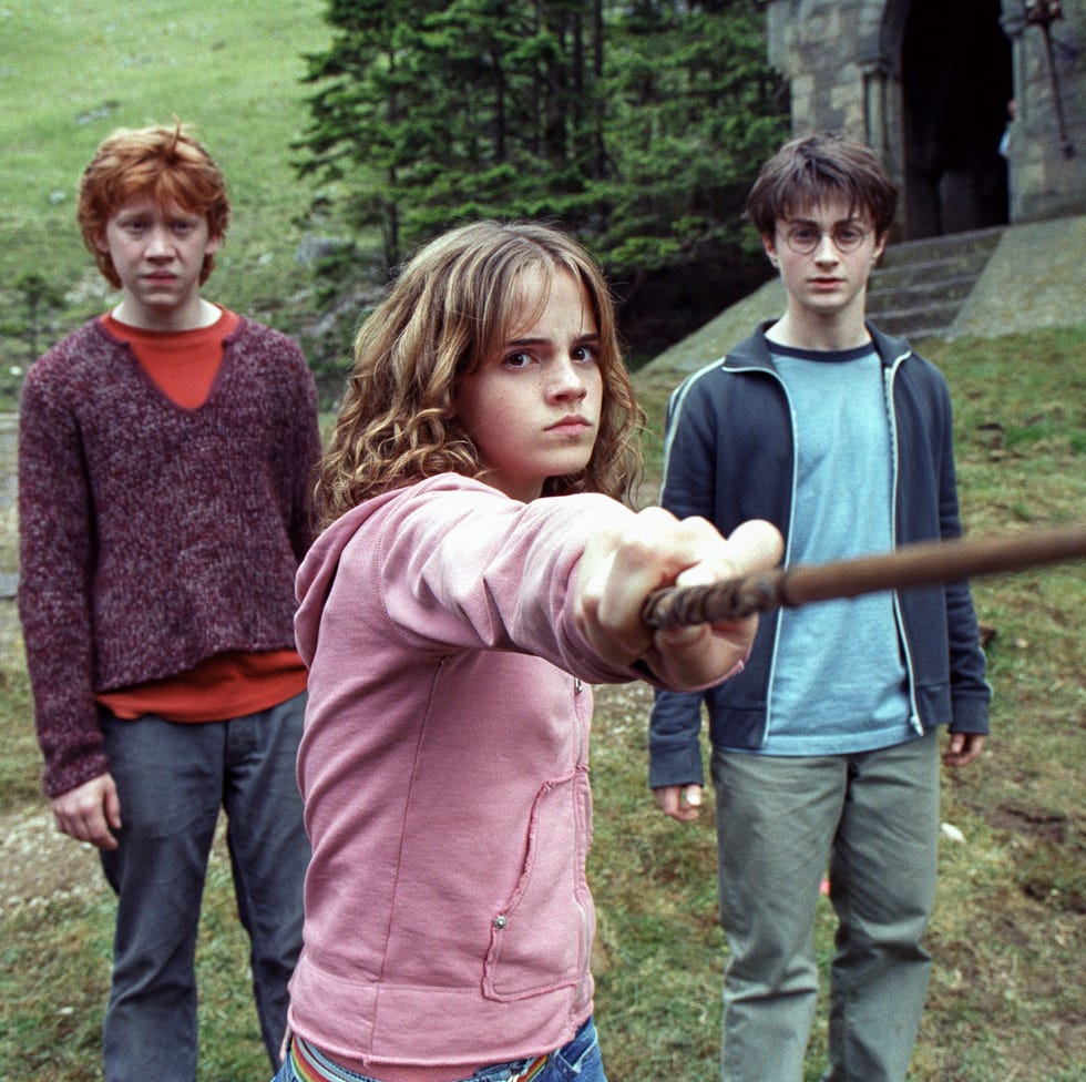 actor, rupert grint (l) emma watson (m) and daniel radcliffe (r) on the set of the film 'harry potter and the prisoner of azkaban', london, england, 2003 (photo by murray close/ getty images) actor, rupert grint (l) emma watson (m) and daniel radcliffe (r) on the set of the film 'harry potter and the prisoner of azkaban', london, england, 2003 (photo by murray close/ getty images)