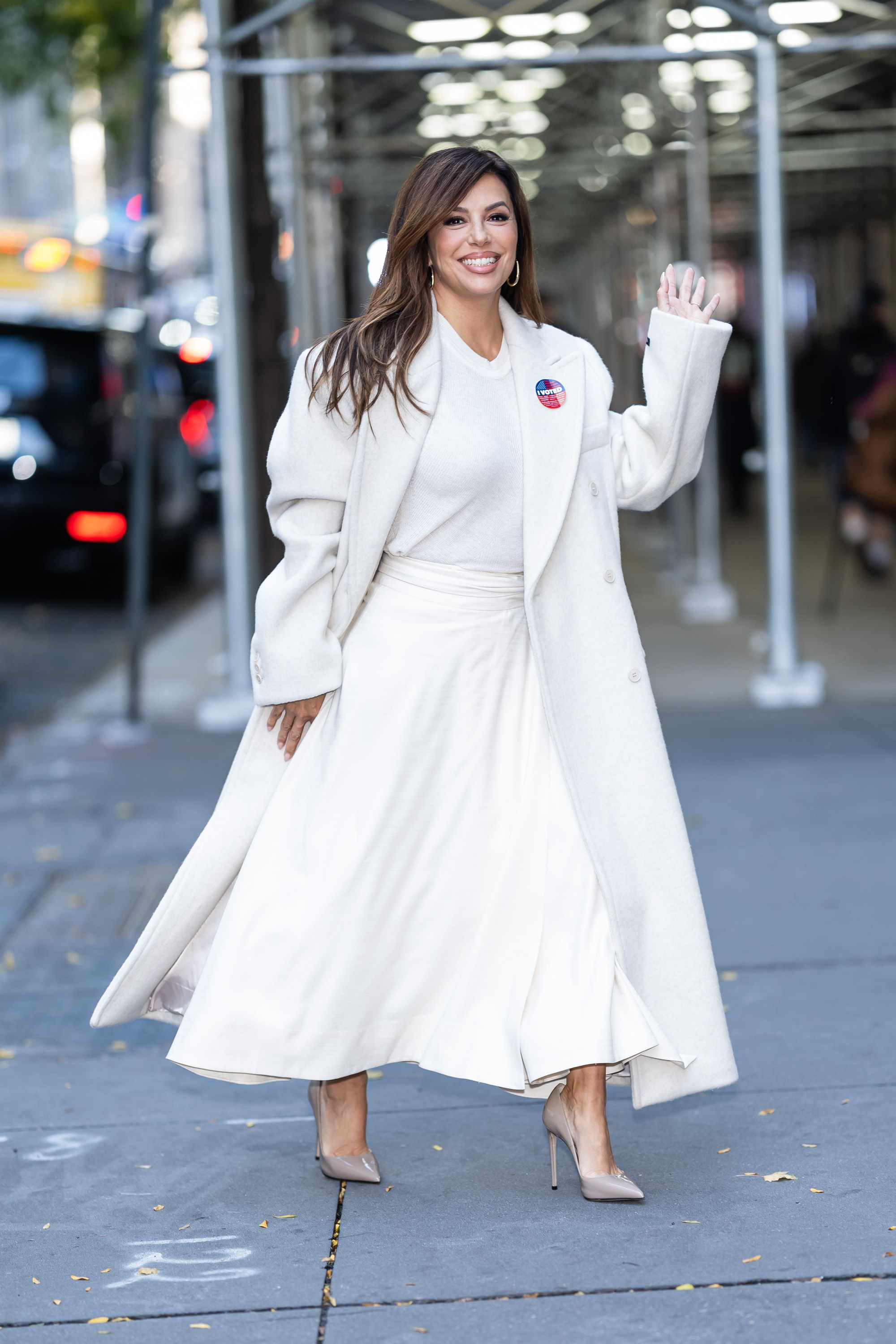 Eva Longoria Styles the Same Chic White Coat Two Ways—Shop It