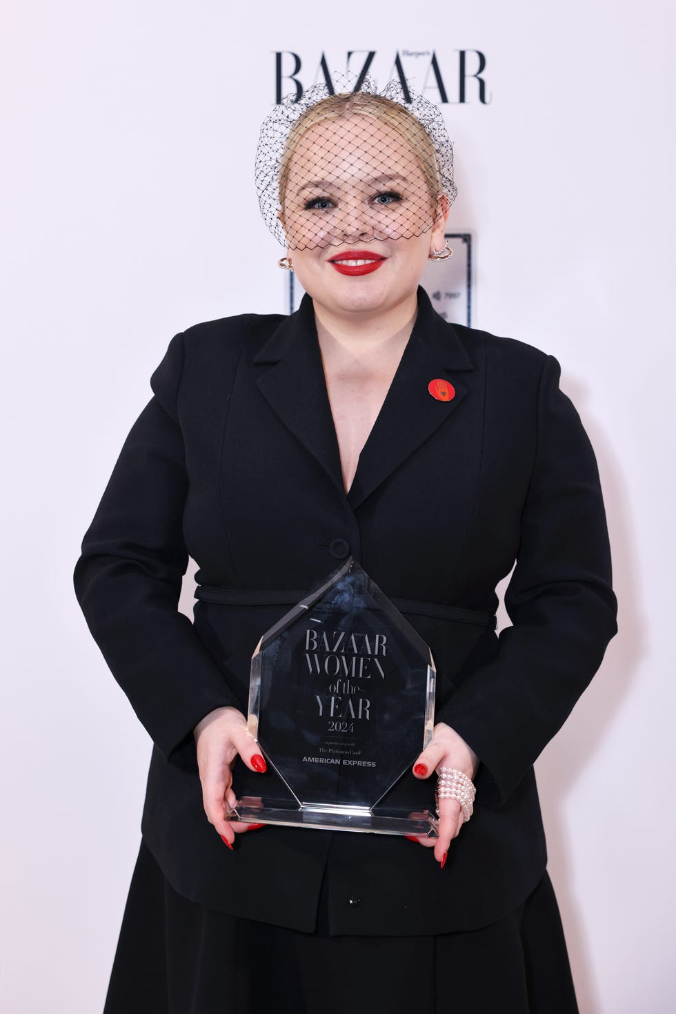 london, england november 05 nicola coughlan, winner of the television actress award, poses at the 2024 harpers bazaar women of the year awards, held in partnership with the platinum card by american express, at claridges hotel on november 5, 2024 in london, england photo by dave benettgetty images for harpers bazaar uk