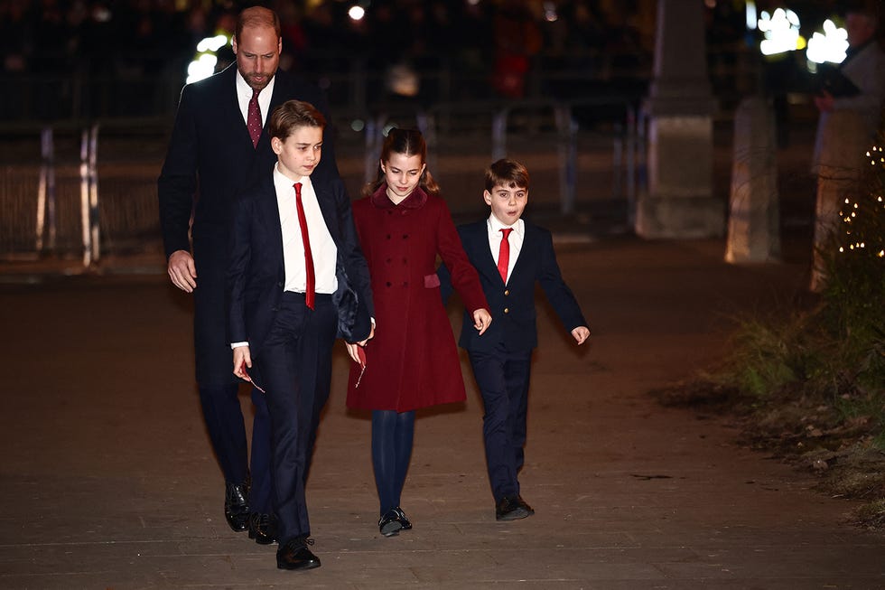 group walking outdoors at night dressed in formal attire
