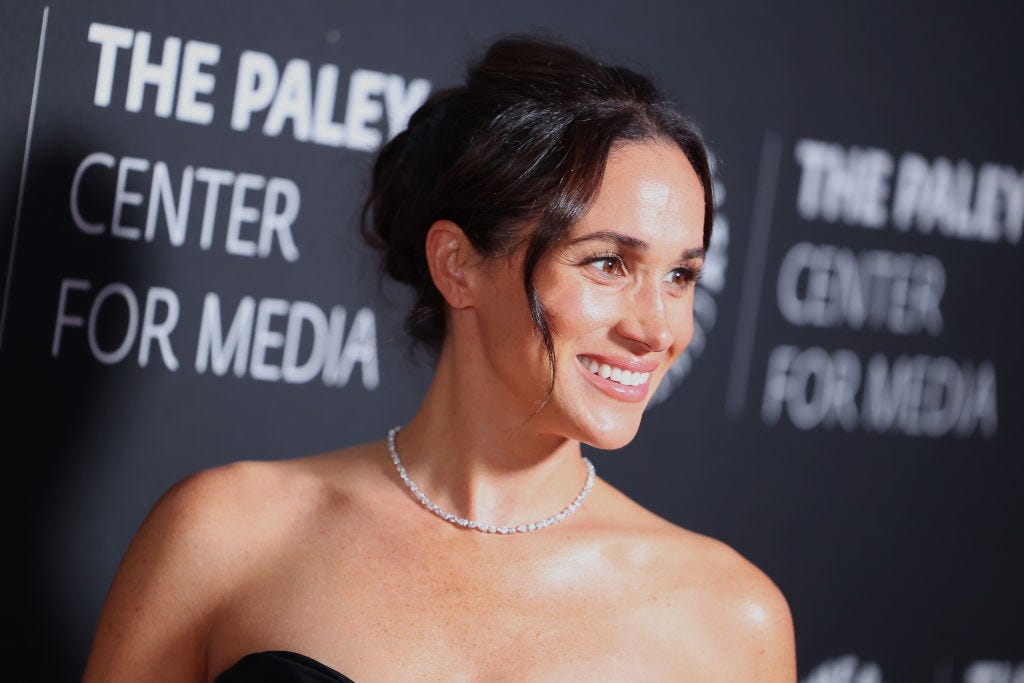 Duchess Meghan Is Timeless in a Strapless Black Gown for a Rare Red-Carpet Appearance