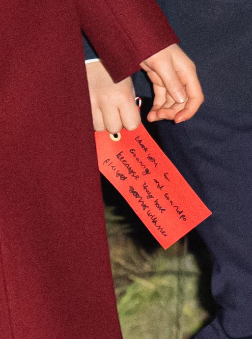 london, england december 06 prince louis of wales holds a hand written note addressed to his grandparents