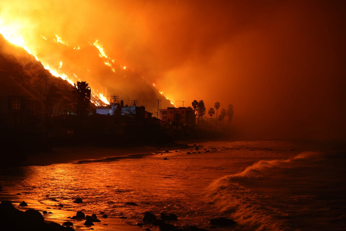 malibu, california january 8, 2025 the palisades fire approaches the pacific ocean along pch in malibu tuesday wally skalijlos angeles times via getty images