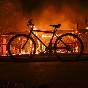 a house in on fire as residents try to escape the site in pacific palisades, california, los angeles a house in on fire as residents try to escape the site in pacific palisades, california, los angeles