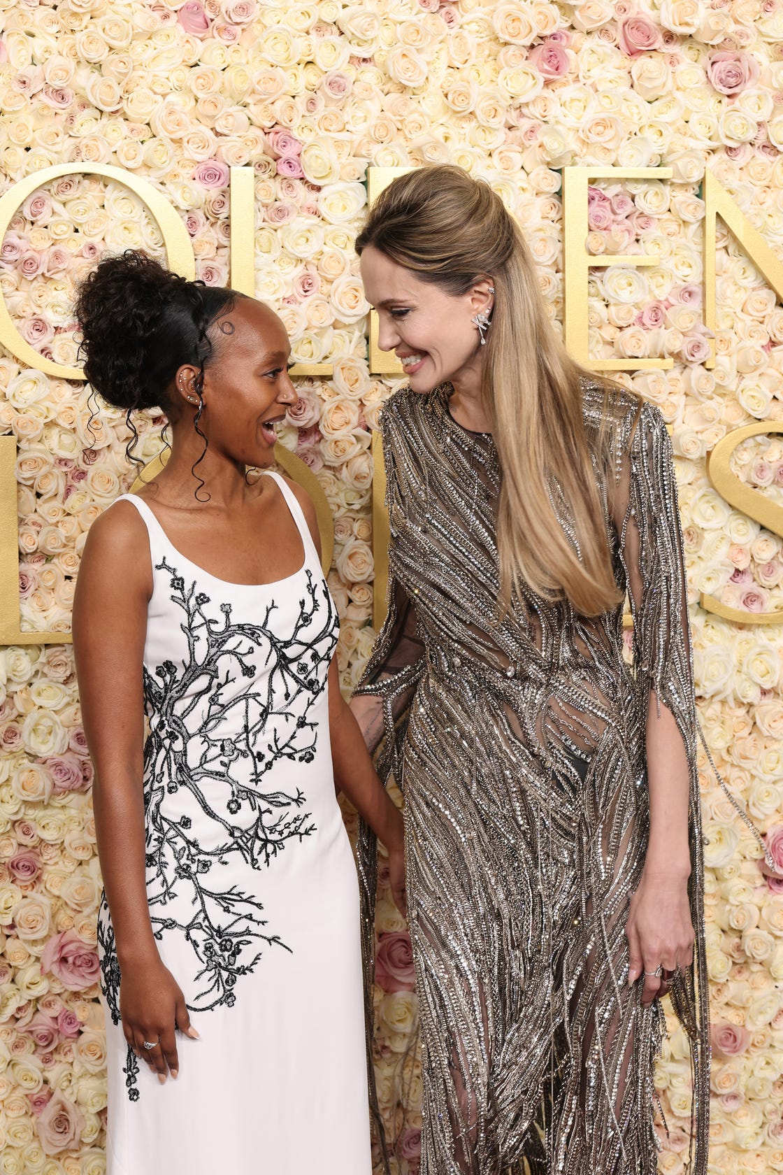 beverly hills, california january 05 l r zahara jolie and angelina jolie attend the 82nd annual golden globe awards at the beverly hilton on january 05, 2025 in beverly hills, california photo by amy sussmangetty images