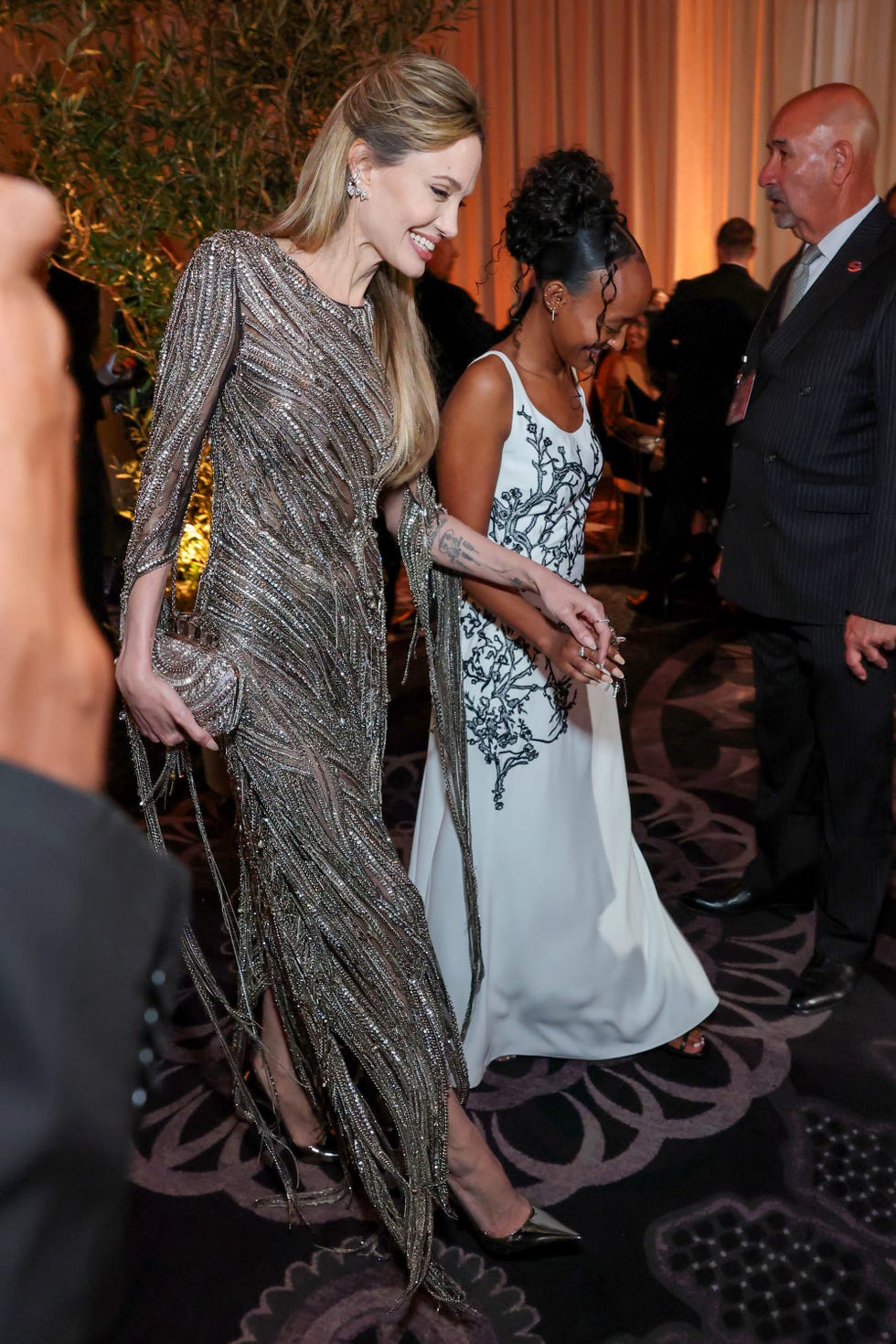 beverly hills, california january 05 l r angelina jolie and zahara jolie attend the 82nd annual golden globe awards at the beverly hilton on january 05, 2025 in beverly hills, california photo by monica schippergetty images