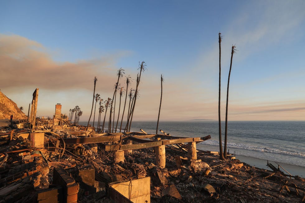 burned out beachfront homes destroyed by the palisades fire are seen along pacific coast highway in malibu, california, on january 10, 2025 massive wildfires that engulfed whole neighborhoods and displaced thousands in los angeles have killed at least 10 people, authorities said, as californias national guard soldiers readied to hit the streets to help quell disorder news of the growing toll, announced late thursday january 9 by the los angeles county medical examiner, came as swaths of the united states second largest city lay in ruins photo by valerie macon  afp photo by valerie maconafp via getty images