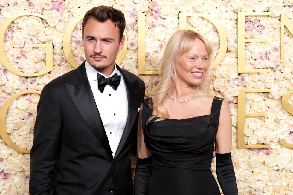 beverly hills, california january 05: (l r) brandon thomas lee and pamela anderson attend the 82nd annual golden globe awards at the beverly hilton on january 05, 2025 in beverly hills, california. (photo by jeff kravitz/filmmagic)