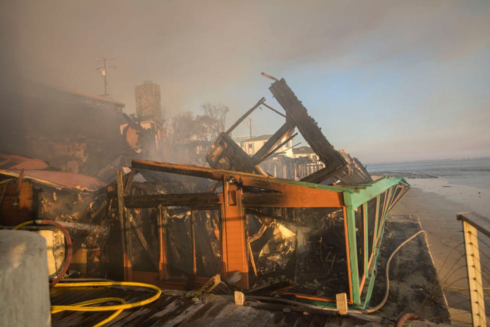 the remains of a beachfront restaurant smolder during the palisades fire in malibu, california, us, on friday, jan 10, 2025 firefighters are making some progress on controlling the deadly blazes that have scorched los angeles, as the toll of destruction rises with entire neighborhoods reduced to ash photographer michael nigrobloomberg via getty images