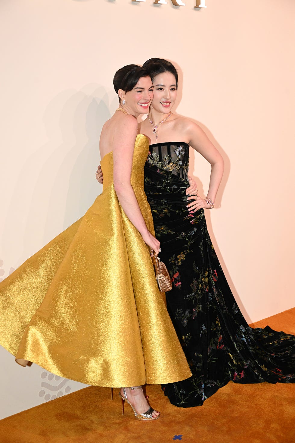 Anne Hathaway with Crystal Liu Yifei at the Bulgari exhibition