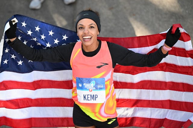 houston, texas january 19: erika kemp stands with an american flag after finishing second in the houston marathon with a time of 2:22:56 on january 19, 2025 in houston, texas. (photo by jack gorman/getty images)