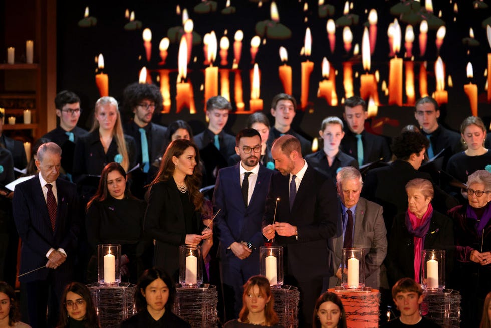 london, england january 27 catherine, princess of wales and prince william, prince of wales light candles during a ceremony commemorating holocaust memorial day on january 27, 2025 in london, england prime minister keir starmer and prince william were among the british officials and celebrities who marked holocaust memorial day and the 80th anniversary of the liberation of auschwitz birkenau during world war ii photo by dan kitwoodgetty images