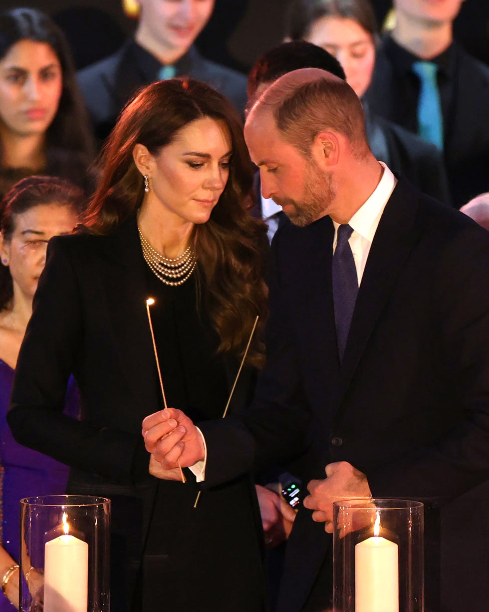 london, england january 27 catherine, princess of wales and prince william, prince of wales light candles during a ceremony commemorating holocaust memorial day on january 27, 2025 in london, england prime minister keir starmer and prince william were among the british officials and celebrities who marked holocaust memorial day and the 80th anniversary of the liberation of auschwitz birkenau during world war ii photo by dan kitwoodgetty images