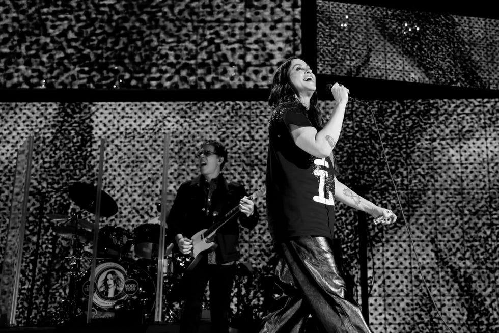 inglewood, california january 30: (editors note: image has been converted to black and white.) alanis morissette performs onstage during the fireaid benefit concert for california fire relief at the kia forum on january 30, 2025 in inglewood, california. (photo by john shearer/getty images for fireaid)