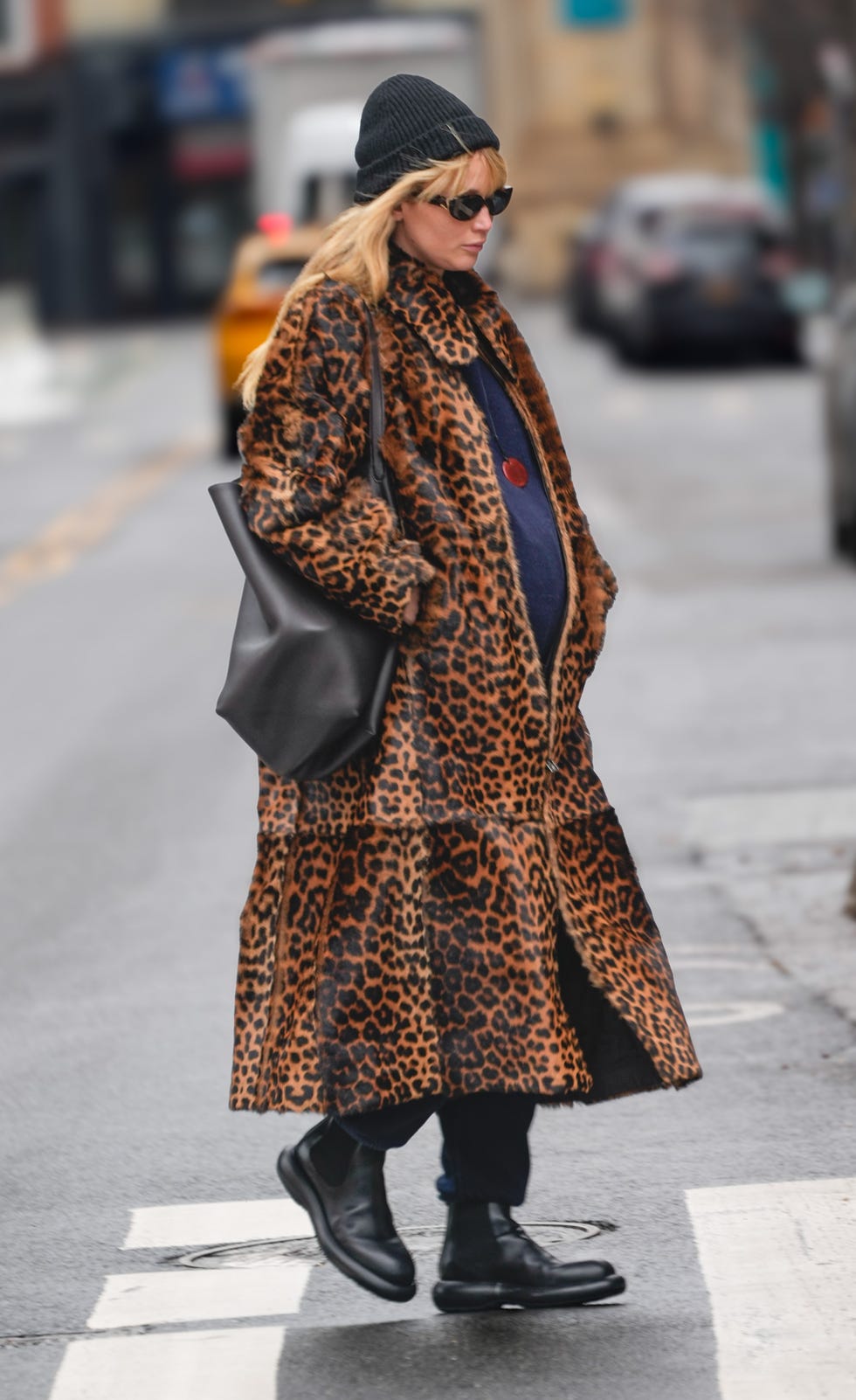 jennifer lawrence walks down sidewalk