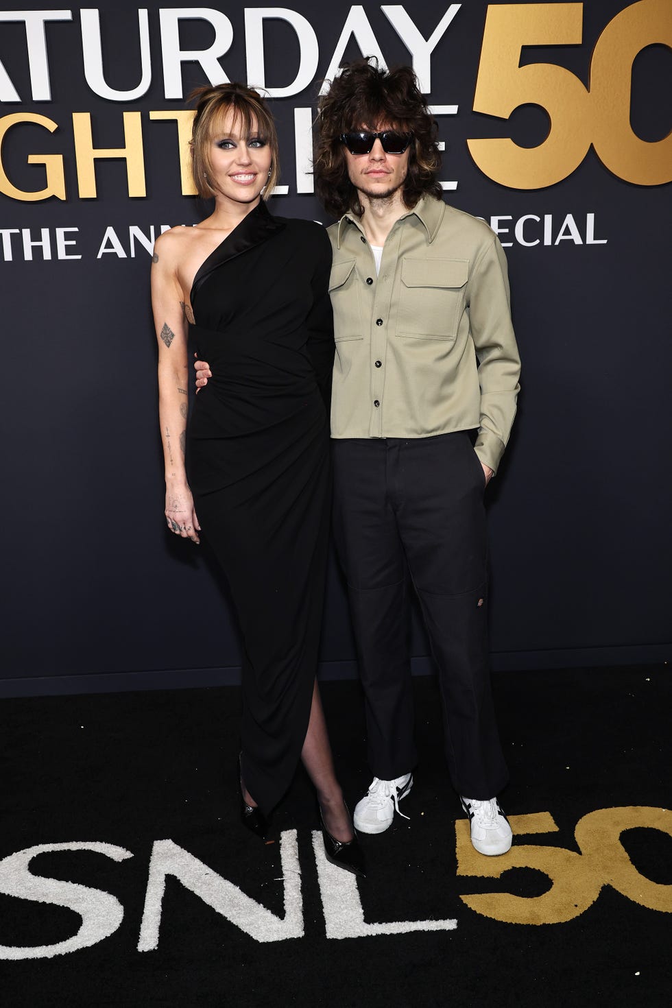 snl50 the red carpet pictured l r miley cyrus and maxx morando on sunday, february 16, 2025 photo by nbcjamie mccarthynbc via getty images