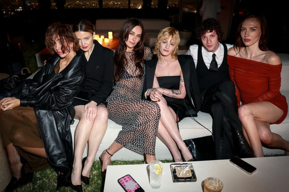 los angeles, california february 28: (l r) nadia lee cohen, lorraine nicholson, devon lee carlson, esther rose mcgregor, dominic sessa and sydney carlson attend the saint laurent x vanity fair pre oscar dinner on february 28, 2025 in los angeles, california. (photo by matt winkelmeyer/getty images for saint laurent )