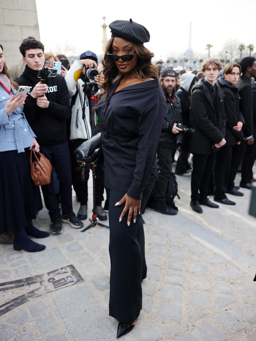 paris, france march 04: (editorial use only for non editorial use please seek approval from fashion house) tems attends the christian dior womenswear fall/winter 2025 2026 show as part of paris fashion week at jardin des tuileries on march 04, 2025 in paris, france. (photo by arnold jerocki/getty images)