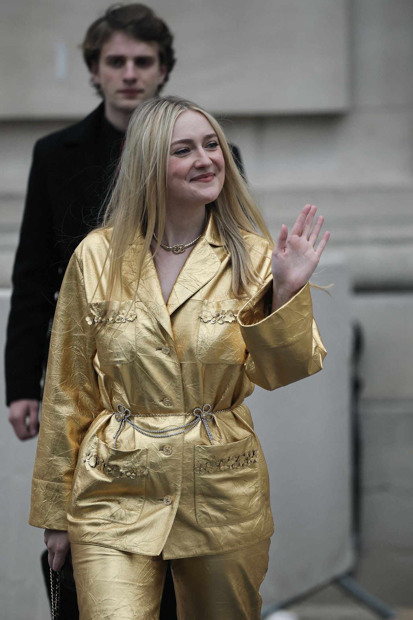 Dakota Fanning Makes Gold Look Like a Neutral in This Cropped Leather Suit