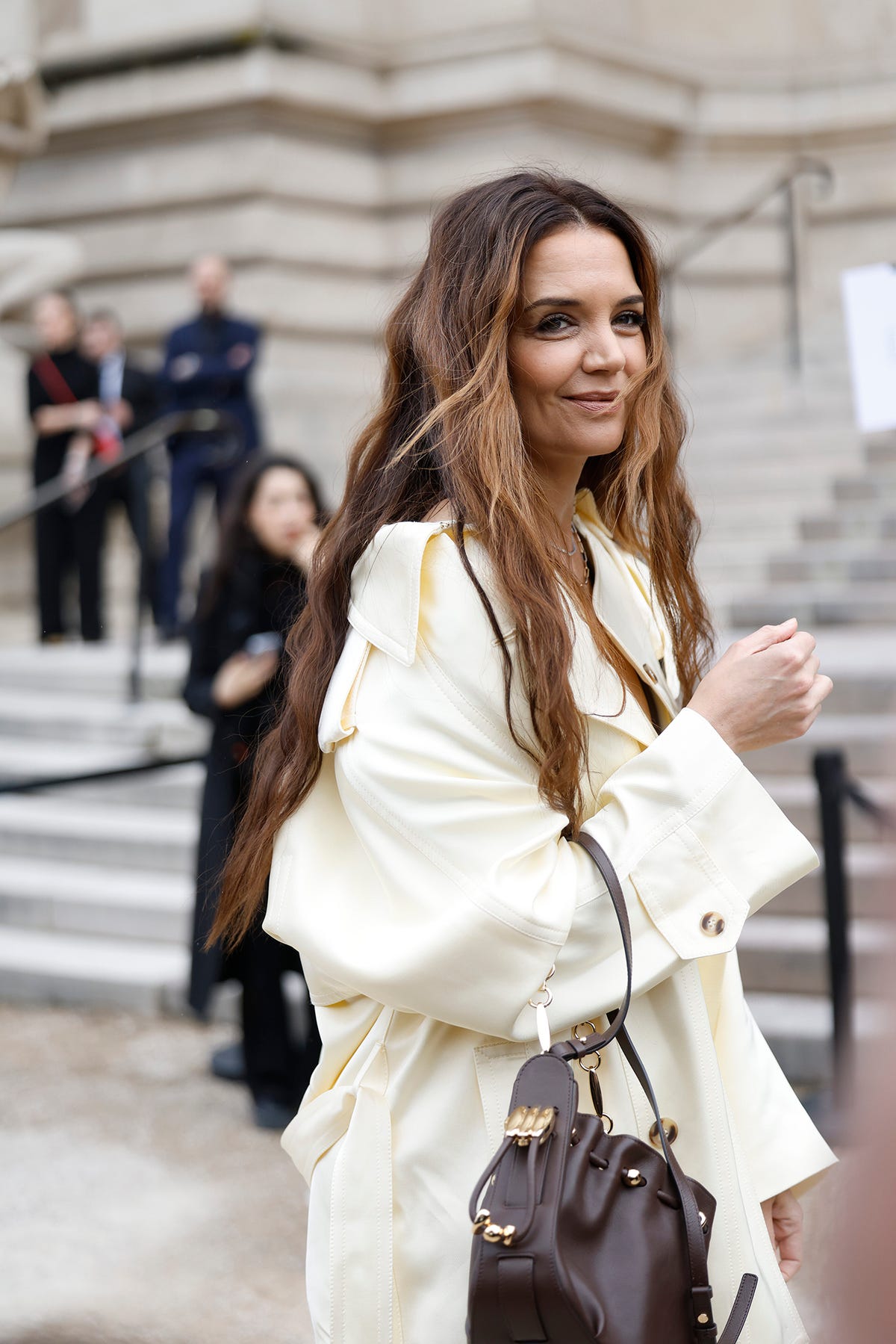 Katie Holmes Shines in Lemon Zest Ensemble at Paris Fashion Week