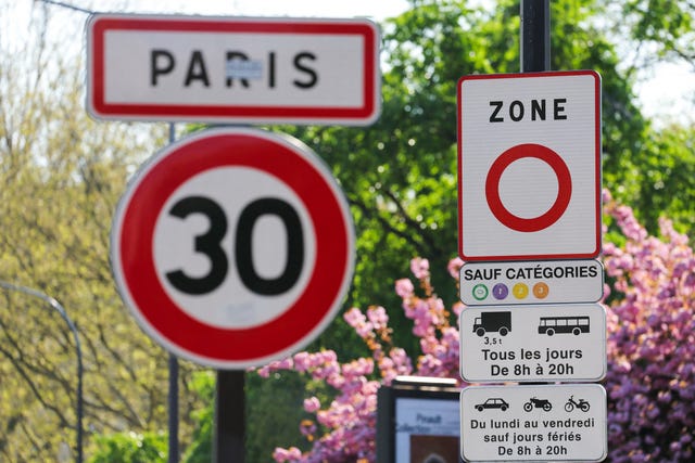 a low emission zone (zone a faible emission, zfe) road sign (r) signals where low and zero emission vehicles classified crit'air 1, crit'air 2 and crit'air 3 are allowed, in paris on april 5, 2025. while the right wing and the rassemblement national (rn) far right parties at the national assembly are planning to suppress low emission zones (zfe) as part of the simplification bill, the government is going to propose retaining a minimum obligation for the paris and lyon urban areas. (photo by thomas samson / afp) (photo by thomas samson/afp via getty images)