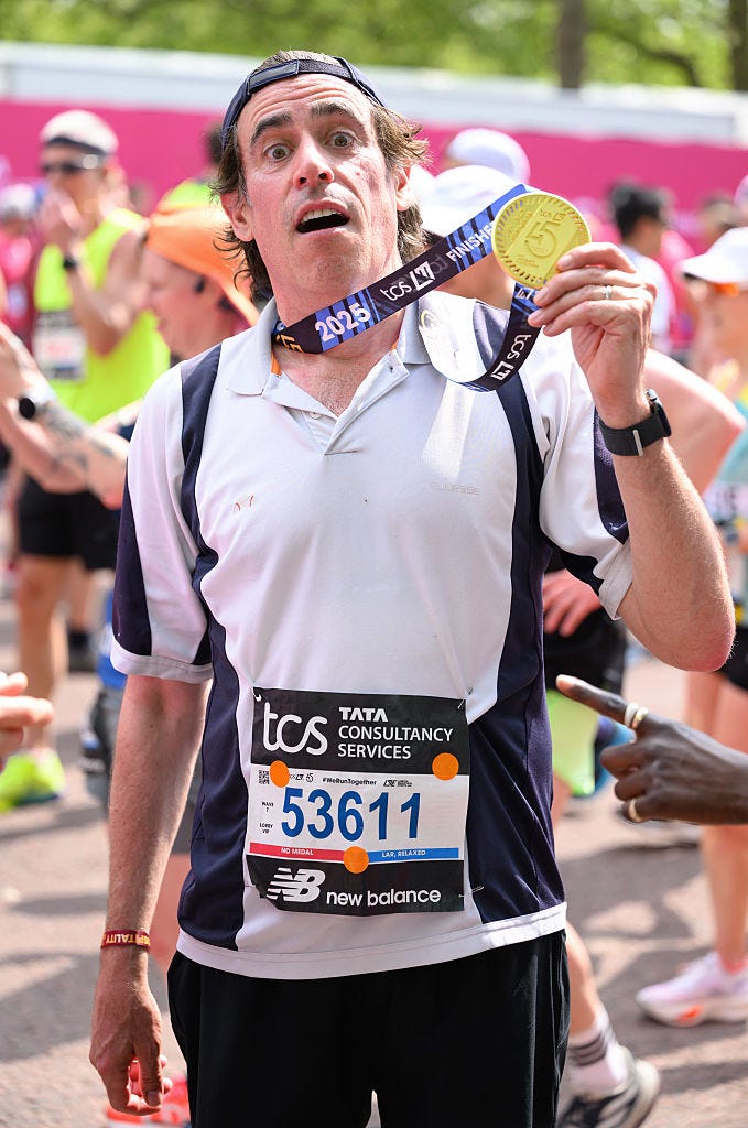 london, england april 27: stephen mangan poses with his medal after completing the tcs london marathon 2025 on april 27, 2025 in london, england. the london marathon was founded by athletes chris brasher and john disley in 1981 and runs over a flat course set around the river thames, starting in blackheath and finishing at the mall. (photo by karwai tang/wireimage)