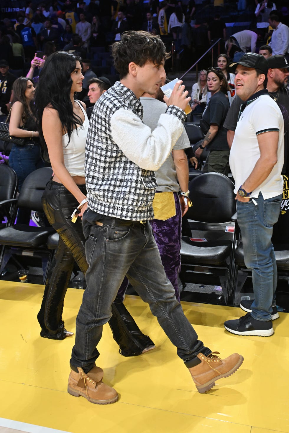 los angeles, california april 30: timothee chalamet and kylie jenner attend a basketball game between the los angeles lakers and the minnesota timberwolves at crypto.com arena on april 30, 2025 in los angeles, california. note to user: user expressly acknowledges and agrees that, by downloading and or using this photograph, user is consenting to the terms and conditions of the getty images license agreement. (photo by allen berezovsky/getty images)