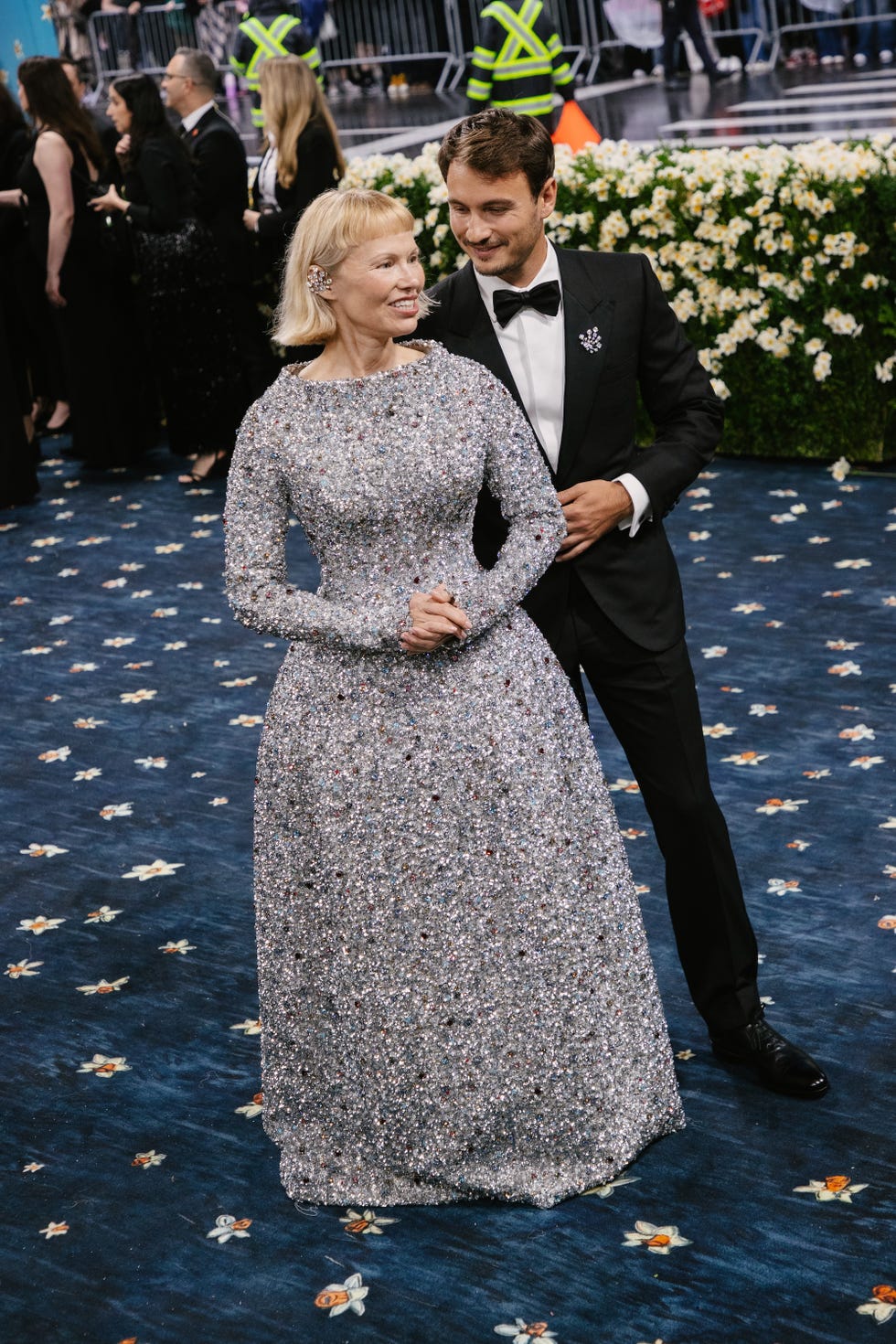 pamela anderson, brandon thomas lee at the 2025 met gala celebrating "superfine: tailoring black style" held at the metropolitan museum of art on may 05, 2025 in new york, new york. (photo by lexie moreland/wwd via getty images)