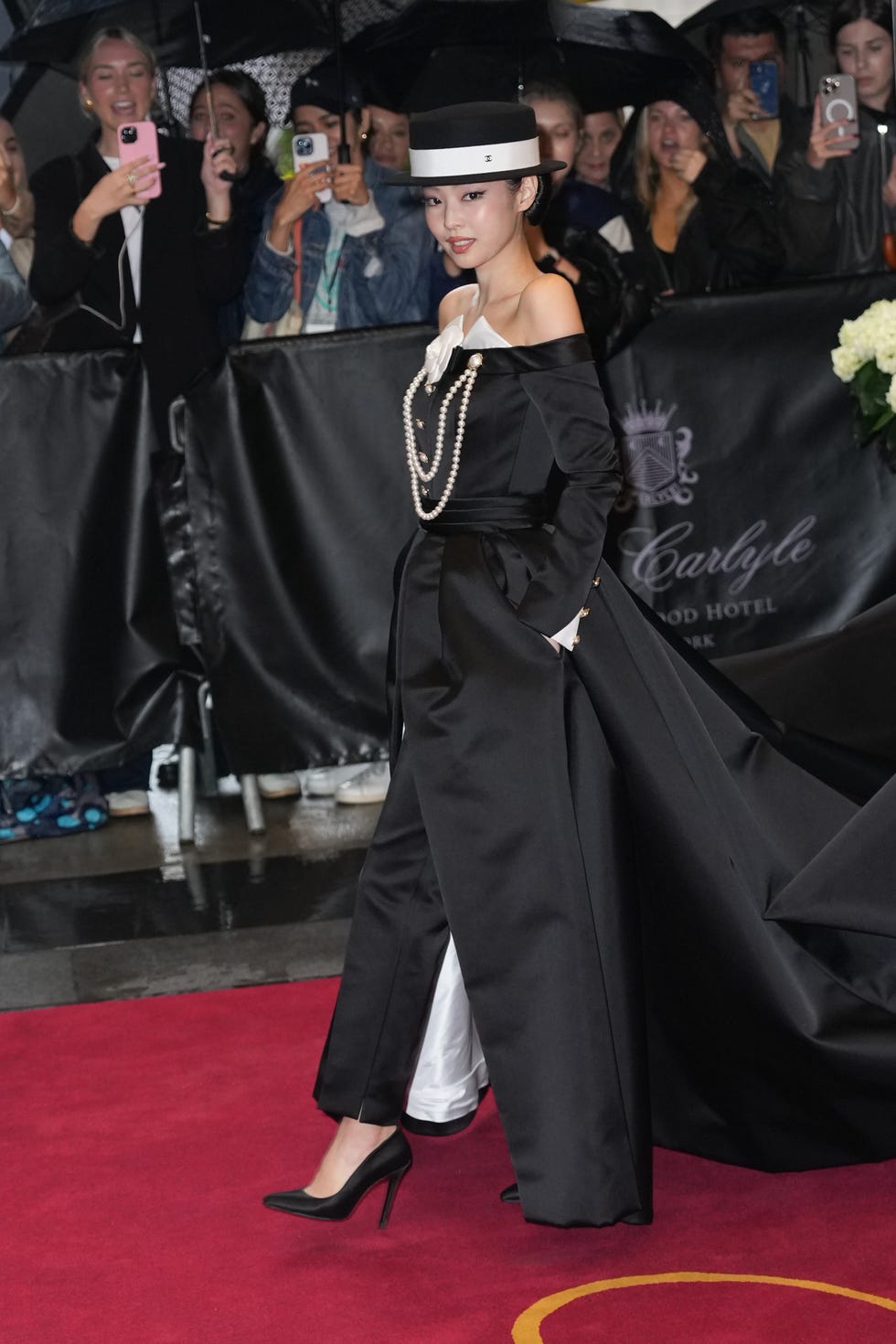 new york, new york may 05: jennie kim leaves the carlyle hotel before the 2025 met gala: superfine: tailoring black style at the metropolitan museum of art on may 05, 2025 in new york city. (photo by john nacion/getty images)