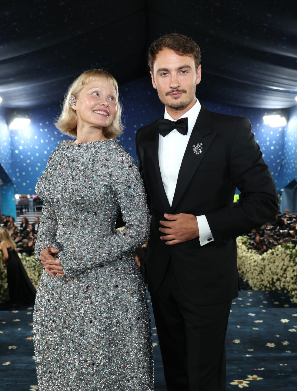new york, new york may 05: (l r) pamela anderson and brandon thomas lee attend the 2025 met gala celebrating superfine: tailoring black style at metropolitan museum of art on may 05, 2025 in new york city. (photo by kevin mazur/mg25/kevin mazur/getty images for the met museum/vogue)