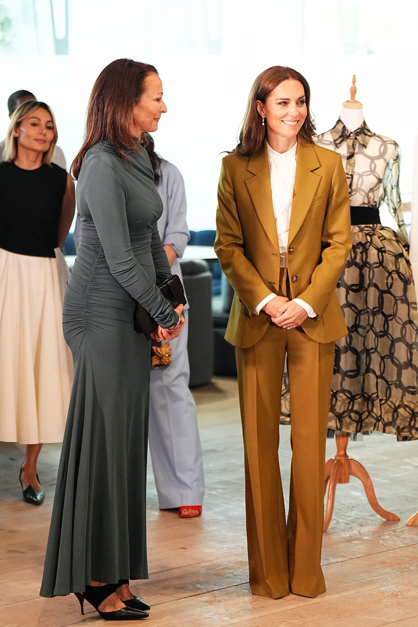 Kate Middleton Pairs an Olive Suit With These Meaningful