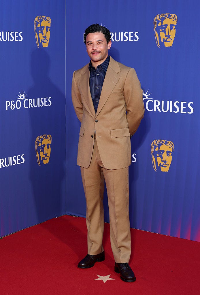 london, england may 11: calvin demba attends the 2025 bafta television awards with po cruises at the royal festival hall on may 11, 2025 in london, england. (photo by mike marsland/wireimage)