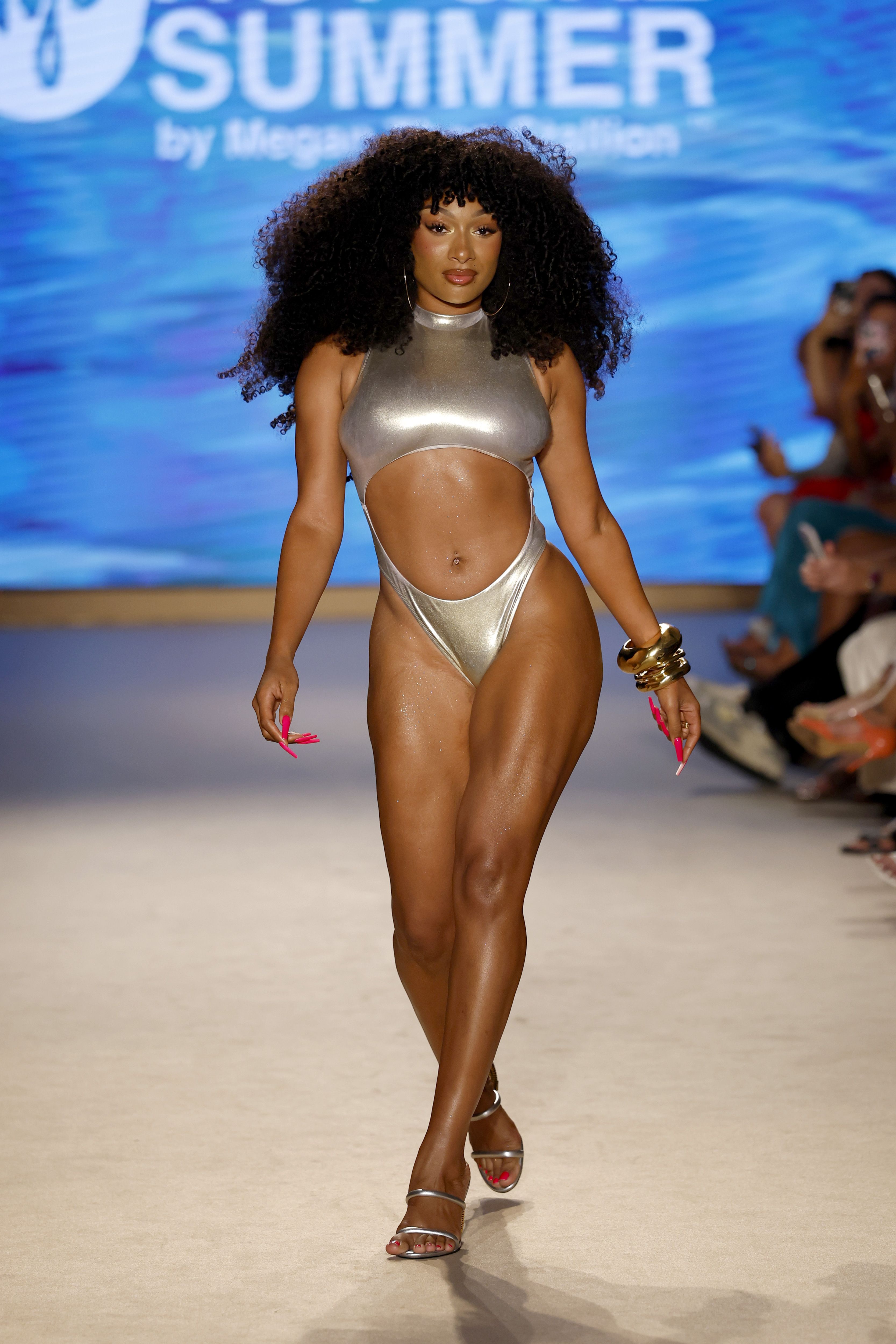 Megan Thee Stallion Struts Down the Miami Runway in a Metallic Silver Swimsuit
