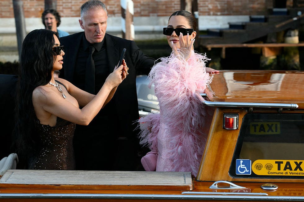 us reality tv personality kim kardashian (l) and us socialite khloe kardashian leave the gritti palace hotel on the wedding day of amazon founder jeff bezos with lauren sanchez, in venice on june 27, 2025. (photo by marco bertorello / afp) (photo by marco bertorello/afp via getty images)