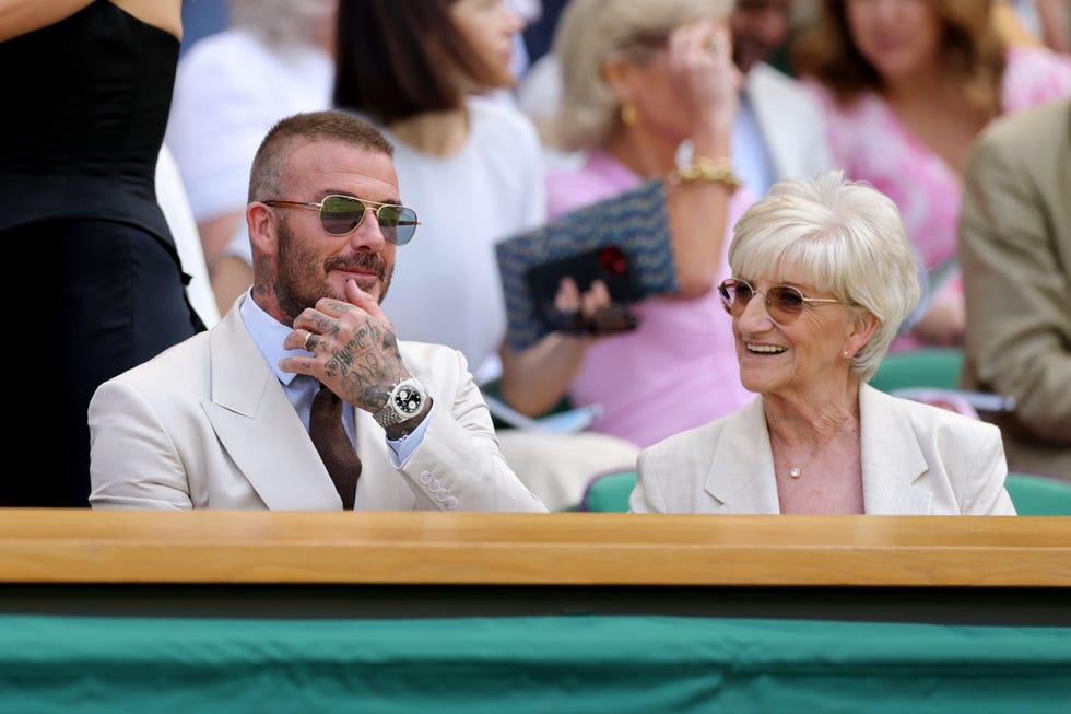 london, england june 30: sir david beckham is seen in the royal box with his mother, sandra beckham prior to the gentlemens singles first round match between fabio fognini of italy and carlos alcaraz of spain on day one of the championships wimbledon 2025 at all england lawn tennis and croquet club on june 30, 2025 in london, england. (photo by julian finney/getty images)
