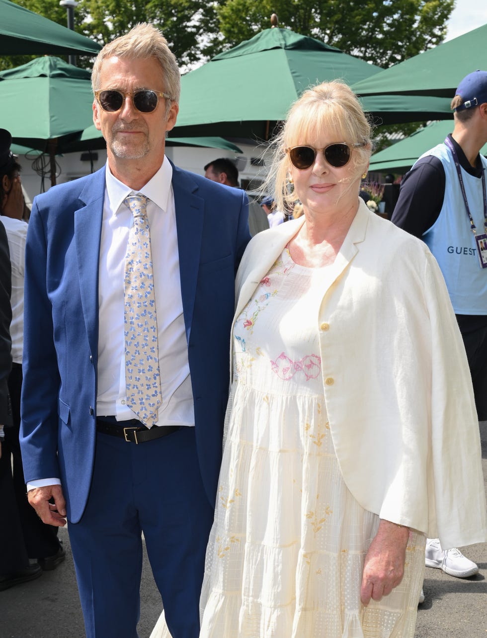 london, england july 01: peter salmon and sarah lancashire attend day two of the wimbledon tennis championships at the all england lawn tennis and croquet club on july 01, 2025 in london, england. (photo by karwai tang/wireimage)