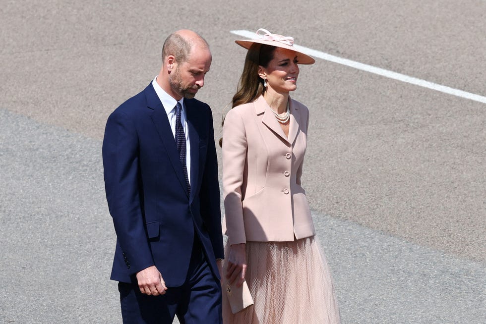 britains prince william, prince of wales and britains catherine, princess of wales arrive to greet frances president emmanuel macron and his wife brigitte macron, upon arrival at raf northolt, west of london, on july 8, 2025, on the first day of a three day state visit to britain. french president emmanuel macron began a three day state visit to britain on tuesday, which will see him address parliament and try to rekindle a purportedly warm relationship with king charles iii. (photo by gonzalo fuentes / pool / afp) (photo by gonzalo fuentes/pool/afp via getty images) 