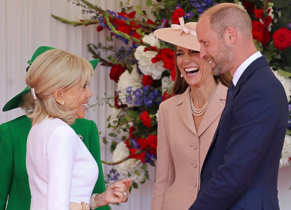 britain's prince william, prince of wales (r) and britain's catherine, princess of wales (2r) react as they greet wife of france's president brigitte macron, during a ceremonial welcome at windsor castle, in windsor west of london, on july 8, 2025, on the first day of a three day state visit to britain. french president emmanuel macron began a three day state visit to britain on tuesday, which will see him address parliament and try to rekindle a purportedly warm relationship with king charles iii. (photo by chris jackson / pool / afp)