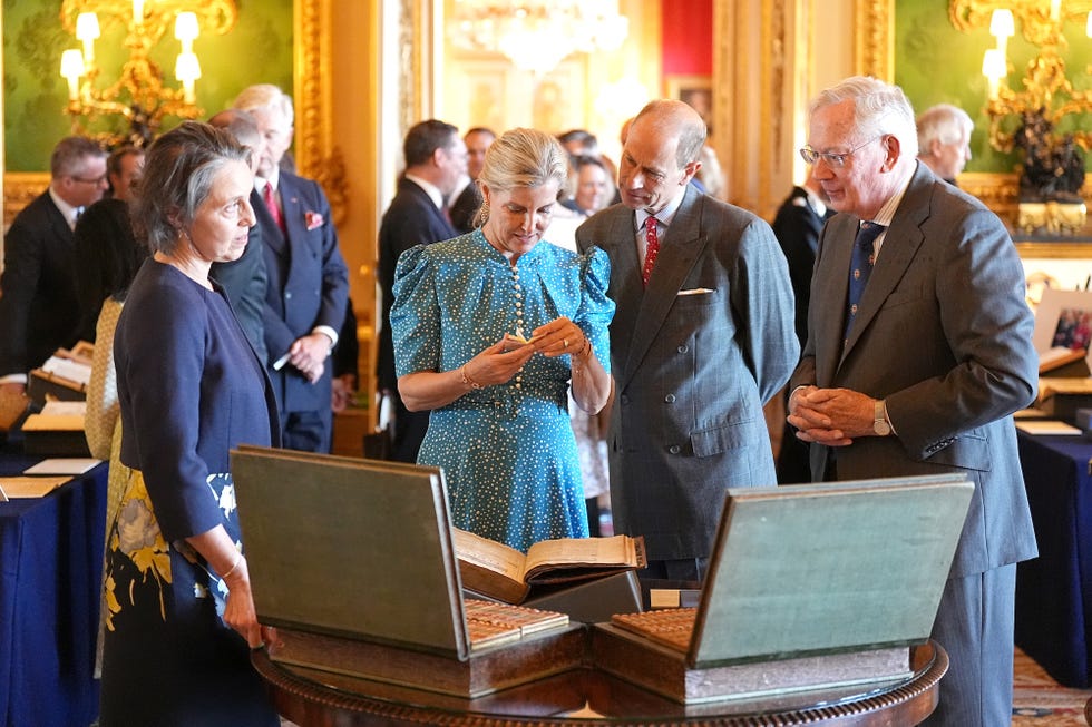 windsor, england july 8: prince edward, duke of edinburgh and sophie, duchess of edinburgh view items on display during the president of france and his wife's visit to the royal collection exhibition, in the green drawing room at windsor castle on july 8, 2025 in windsor, england. president emmanuel macron and mrs brigitte macron visit the uk in the first visit state visit made by france in 17 years. they are staying at windsor castle, hosted by king charles iii and queen camilla, and a banquet will be held there in their honour. the macrons will visit imperial college, and the president will address parliament during his stay. (photo by aaron chown wpa pool/getty images)